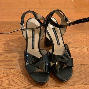 Black patent leather high heeled sandals